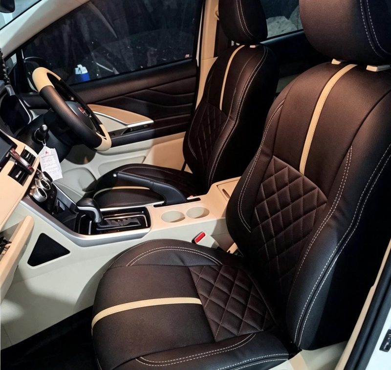 Jok mobil hasil pengerjaan Andika Jaya Jok, kulit hitam dengan motif diamond dan list krem