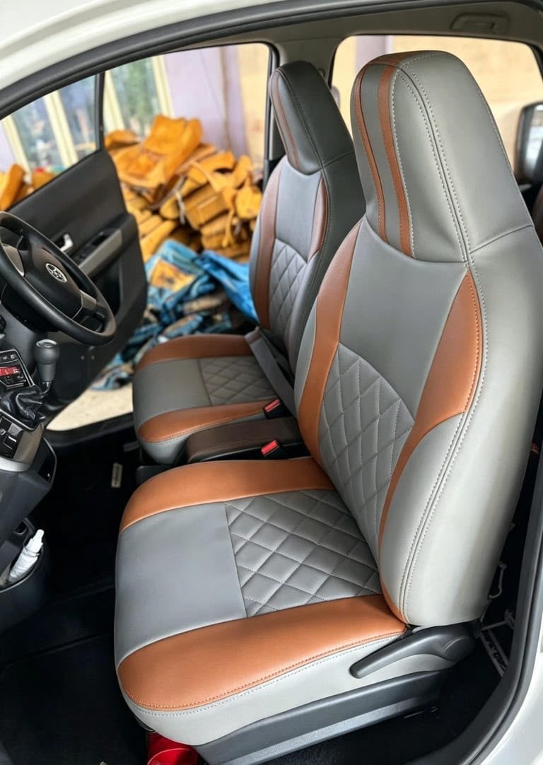 Jok mobil semi beklit warna abu-abu dengan kombinasi oranye